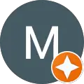 M F