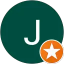 J B